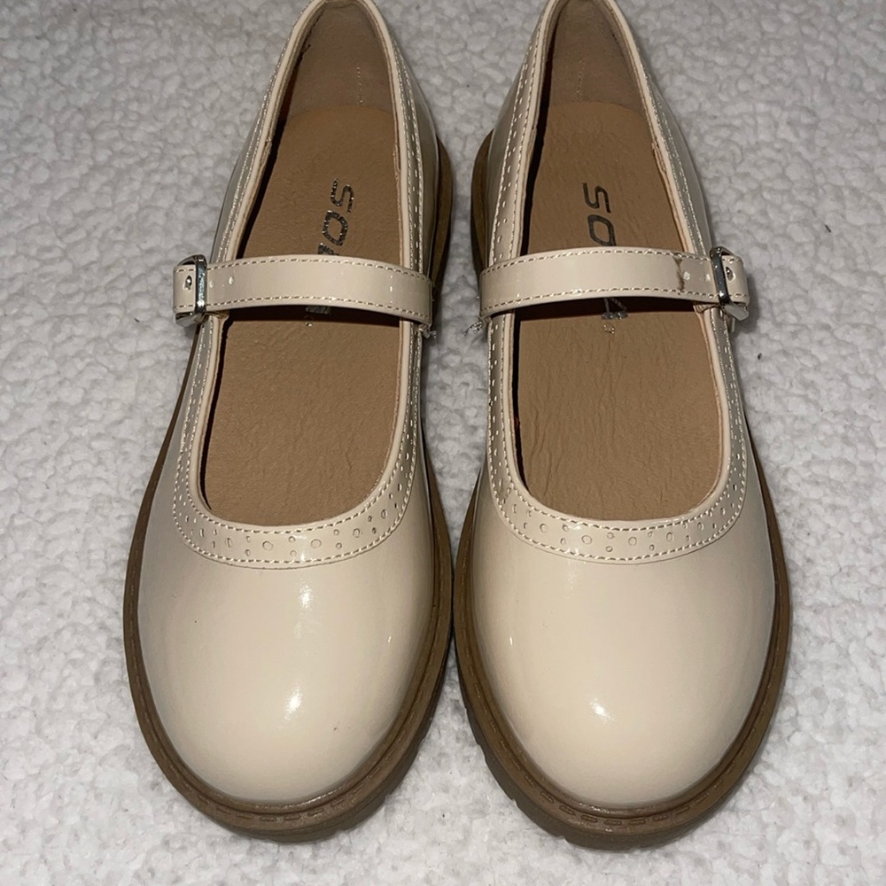 Cream colored dress shoes